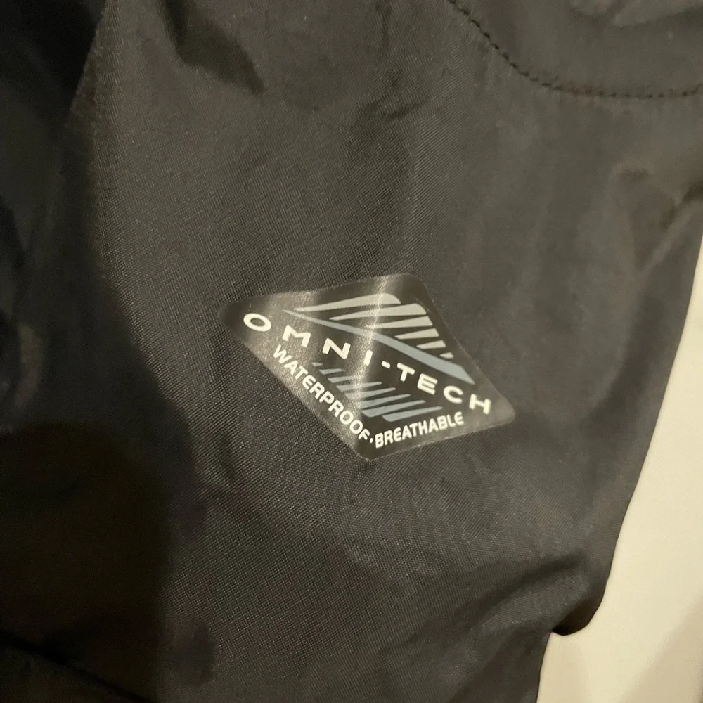 Women’s black hooded waterproof Columbia jacket. Size S